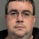 Philip Hughes arrested